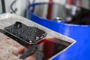 Why Is My Car Leaking Transmission Fluid? Causes & Fixes